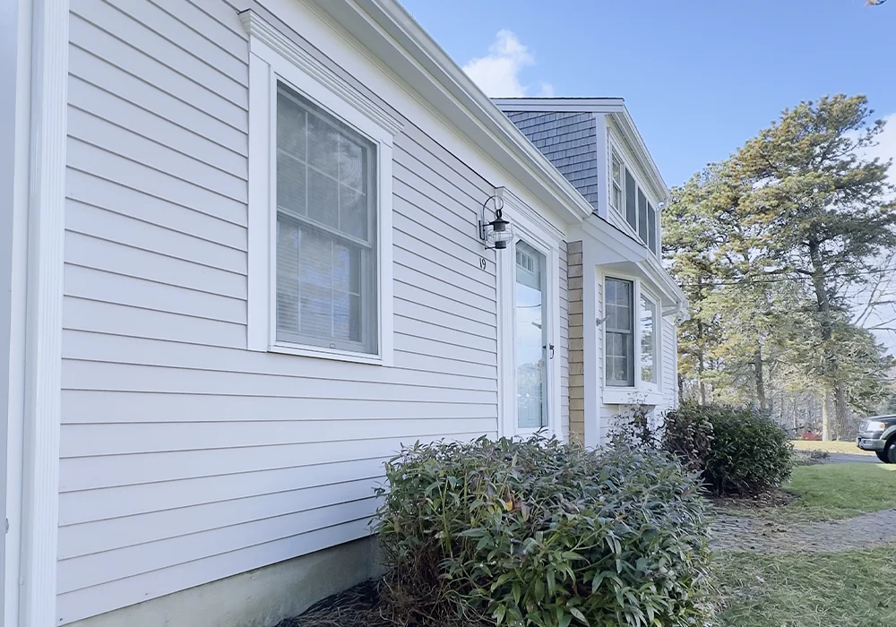 Coastal home exterior painting by Sartori Corporation